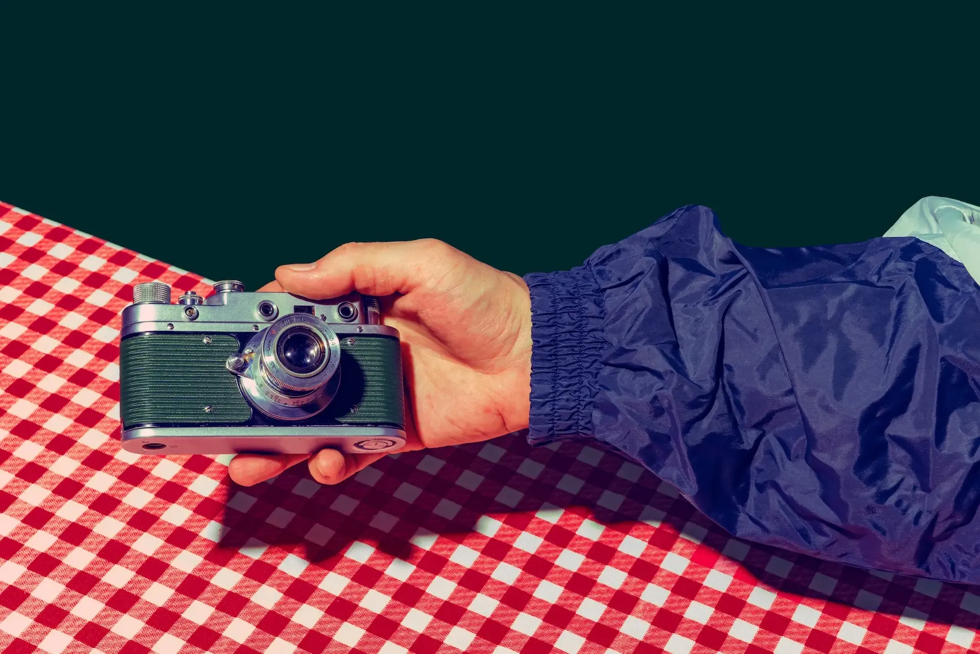 Holding an old camera 